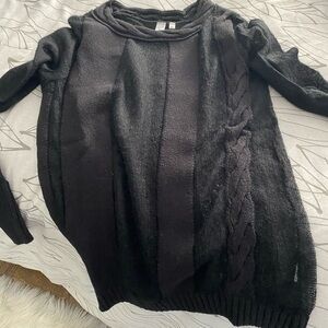 Si-iae, black sweater with black cami, see- through columns adding some fun